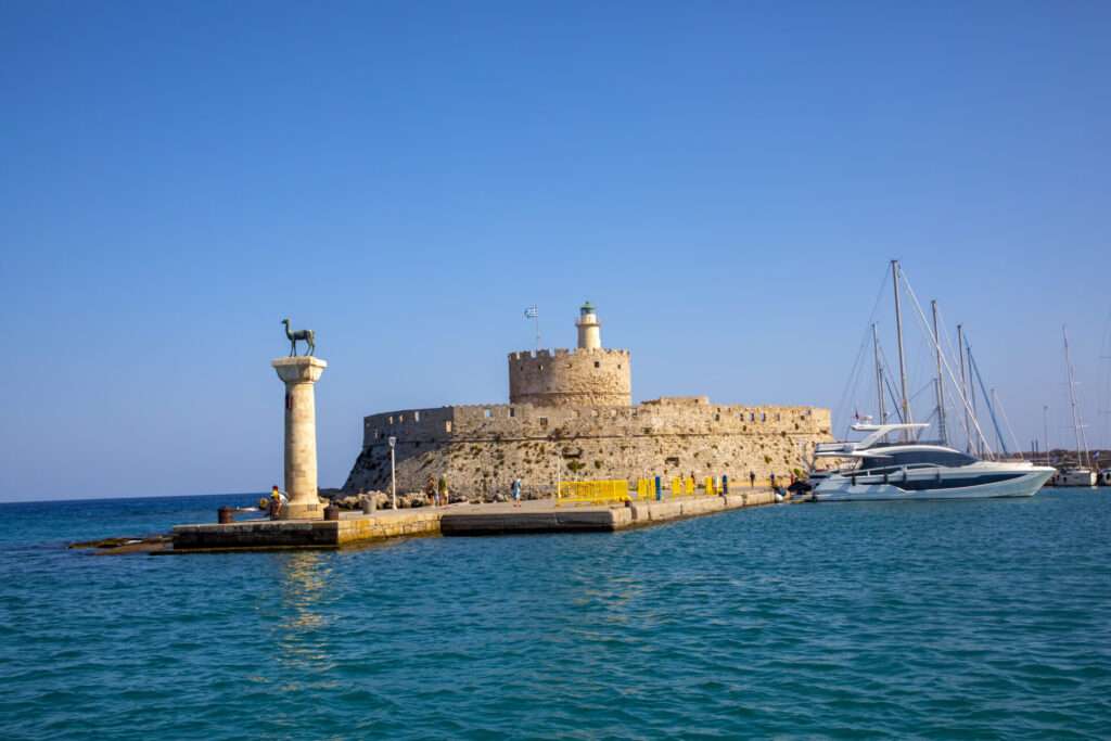 Landscape With Mandraki Harbour And Two Statues, Elefos And Elaf